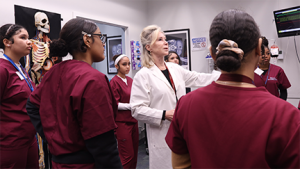 Clinical educator instructing HS students