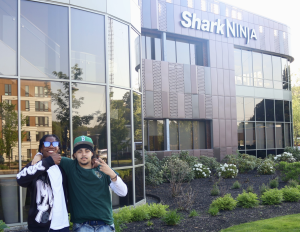 two teenagers pose outside SharkNinja HQ!